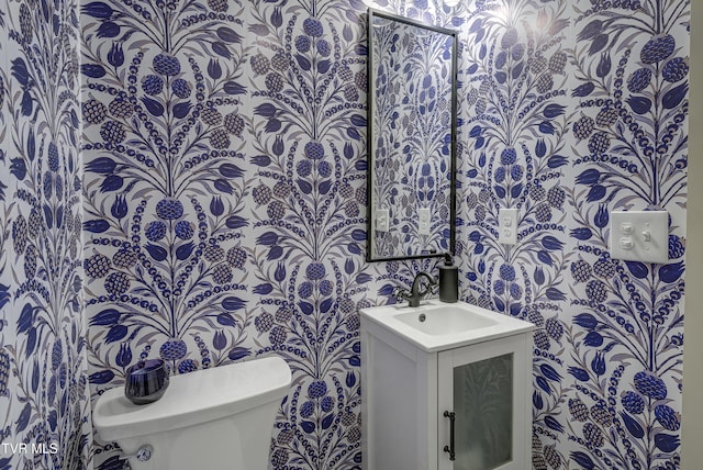 801 Watauga St, Kingsport, TN 37660 - half bath with vanity and wallpapered walls