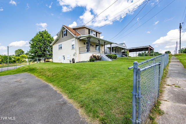934 Massachusetts Ave, Bristol, VA 24201 - view of side of property featuring a porch and stucco siding