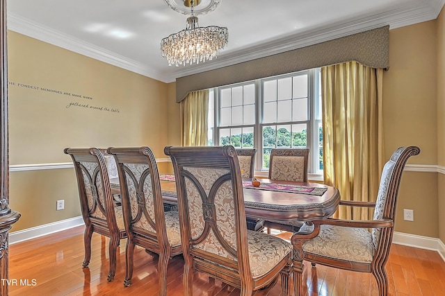 287 Pactolus Rd, Kingsport, TN 37663 - dining room featuring ornamental molding, a chandelier, and light wood-style flooring