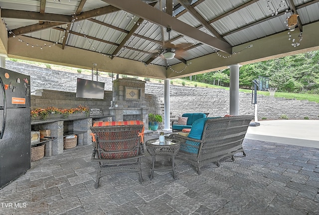 287 Pactolus Rd, Kingsport, TN 37663 - view of patio / terrace featuring a gazebo, an outdoor stone fireplace, a ceiling fan, and exterior kitchen