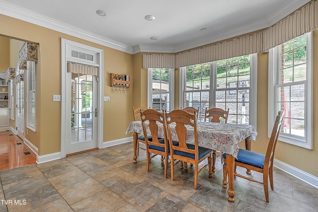 287 Pactolus Rd, Kingsport, TN 37663 - dining space with healthy amount of natural light, stone tile floors, and ornamental molding