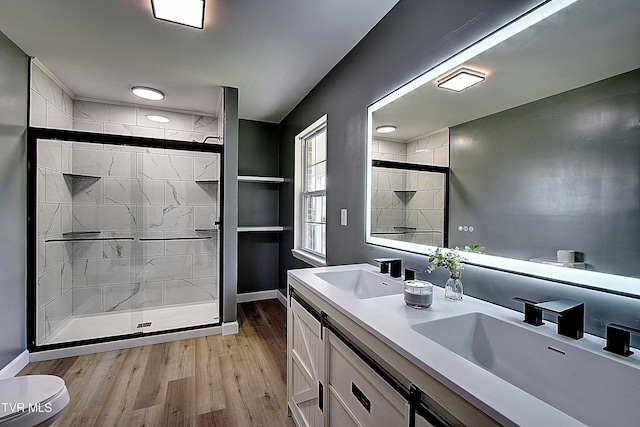 102 Spring Hill Dr, Unicoi, TN 37692 - full bathroom with wood finished floors, a stall shower, and double vanity