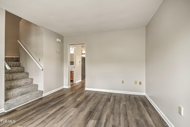103 Northwinds Dr, Bristol, VA 24201 - empty room featuring dark wood-style floors and stairs