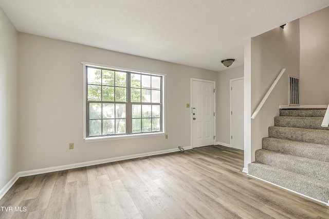 103 Northwinds Dr, Bristol, VA 24201 - entryway with wood finished floors, healthy amount of natural light, and stairs