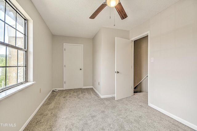 103 Northwinds Dr, Bristol, VA 24201 - spare room with carpet, a ceiling fan, healthy amount of natural light, and a textured ceiling