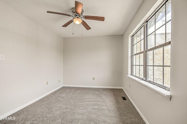 103 Northwinds Dr, Bristol, VA 24201 - spare room with carpet, a ceiling fan, and a textured ceiling