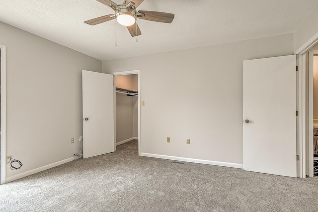 103 Northwinds Dr, Bristol, VA 24201 - unfurnished bedroom featuring carpet floors, a spacious closet, a ceiling fan, and a closet