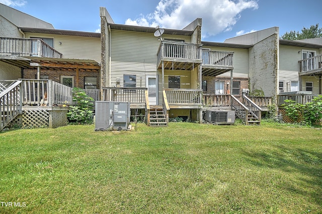 103 Northwinds Dr, Bristol, VA 24201 - rear view of property featuring a wooden deck, a lawn, and a balcony