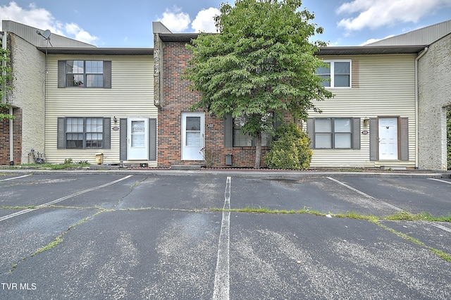 103 Northwinds Dr, Bristol, VA 24201 - view of property with uncovered parking and brick siding
