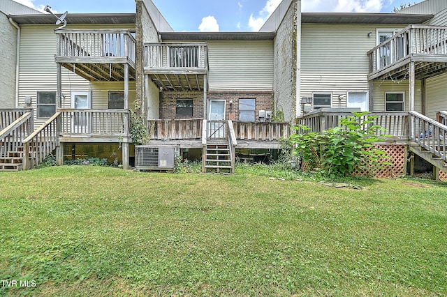 103 Northwinds Dr, Bristol, VA 24201 - rear view of house with a yard, a deck, and a balcony