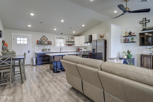 457 W St, Greeneville, TN 37745 - living area featuring a ceiling fan, plenty of natural light, light wood-style flooring, recessed lighting, and lofted ceiling