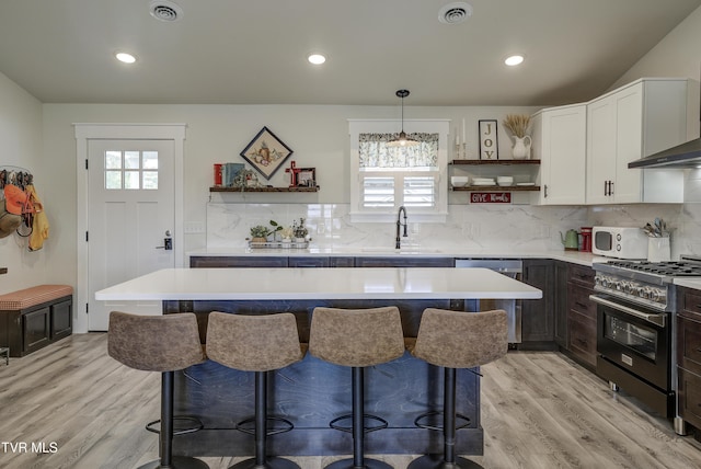 457 W St, Greeneville, TN 37745 - kitchen featuring gas range oven, open shelves, dishwasher, healthy amount of natural light, and recessed lighting