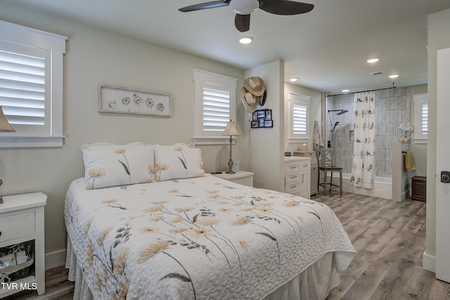 457 W St, Greeneville, TN 37745 - bedroom with wood finished floors, recessed lighting, a ceiling fan, and ensuite bathroom