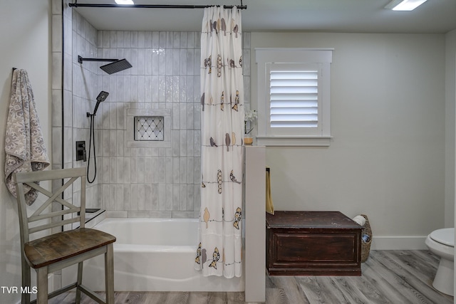 457 W St, Greeneville, TN 37745 - bathroom featuring shower / tub combo and wood finished floors