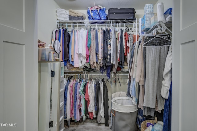 457 W St, Greeneville, TN 37745 - spacious closet featuring wood finished floors
