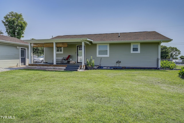 457 W St, Greeneville, TN 37745 - back of house with a lawn, covered porch, and a shingled roof