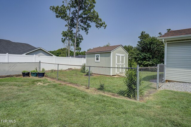 457 W St, Greeneville, TN 37745 - fenced backyard with a shed