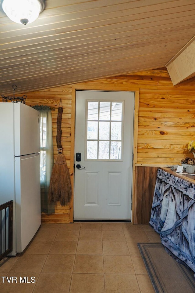 3521 James Phillips Way, Sevierville, TN 37876 - entryway featuring vaulted ceiling, light tile patterned flooring, and wooden ceiling
