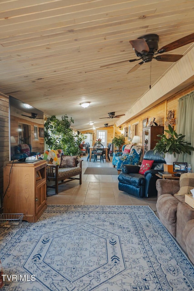 3521 James Phillips Way, Sevierville, TN 37876 - living room with wooden walls, light tile patterned flooring, ceiling fan, and wood ceiling