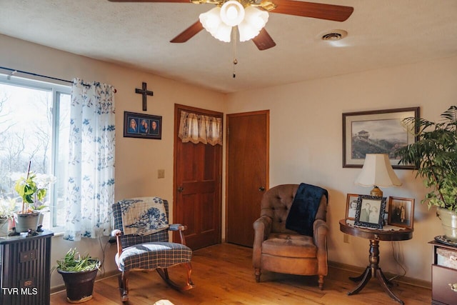 3521 James Phillips Way, Sevierville, TN 37876 - sitting room with wood finished floors and ceiling fan