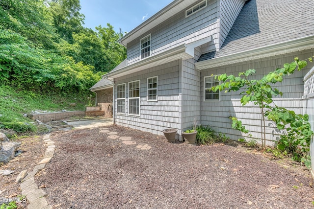 82 Hiddenbrook Ln Unit 82, Gray, TN 37615 - view of side of home with roof with shingles and a patio area