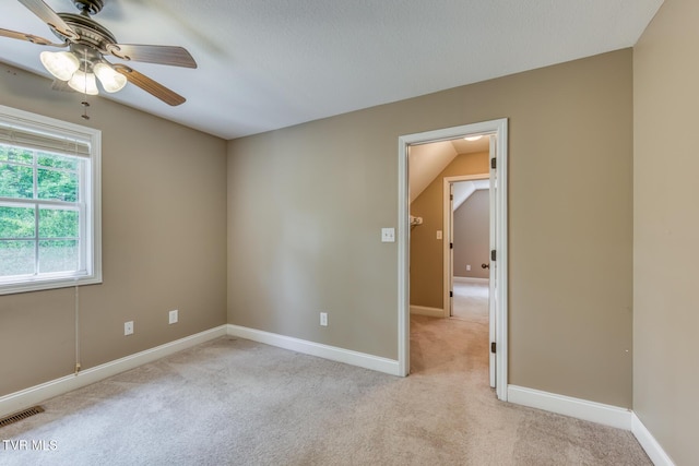 82 Hiddenbrook Ln Unit 82, Gray, TN 37615 - unfurnished room featuring light colored carpet, ceiling fan, and lofted ceiling