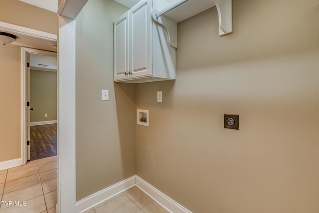 82 Hiddenbrook Ln Unit 82, Gray, TN 37615 - washroom featuring cabinet space, light tile patterned flooring, electric dryer hookup, and washer hookup