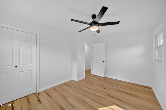 252 Kiser Cir, Jonesborough, TN 37659 - unfurnished bedroom featuring wood finished floors, a closet, and a ceiling fan