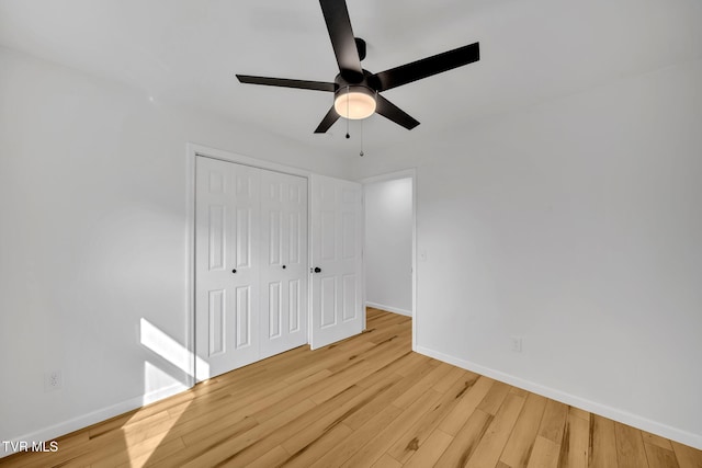 252 Kiser Cir, Jonesborough, TN 37659 - unfurnished bedroom with wood finished floors, a closet, and a ceiling fan