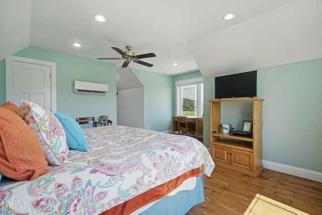 313 Treadway Trl, Jonesborough, TN 37659 - bedroom featuring a wall mounted air conditioner, wood finished floors, recessed lighting, lofted ceiling, and a ceiling fan