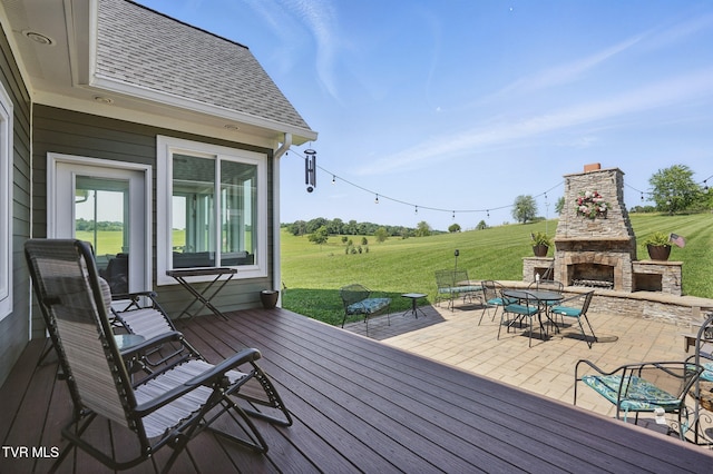 313 Treadway Trl, Jonesborough, TN 37659 - deck with an outdoor stone fireplace, a lawn, and a patio area