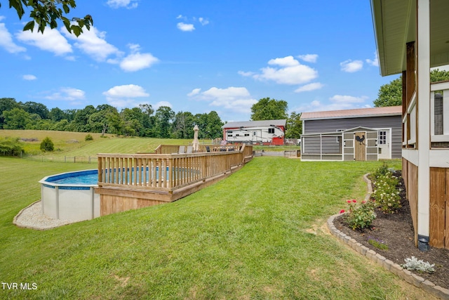 695 Opie Arnold Rd, Limestone, TN 37681 - view of yard featuring an outdoor pool, an outdoor structure, and a deck