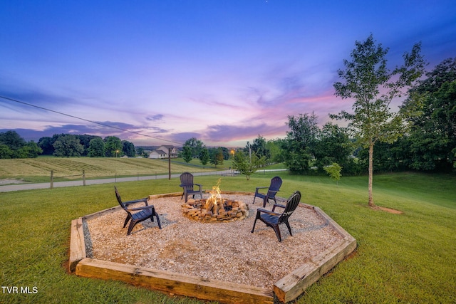 695 Opie Arnold Rd, Limestone, TN 37681 - yard at dusk with a fire pit and a yard