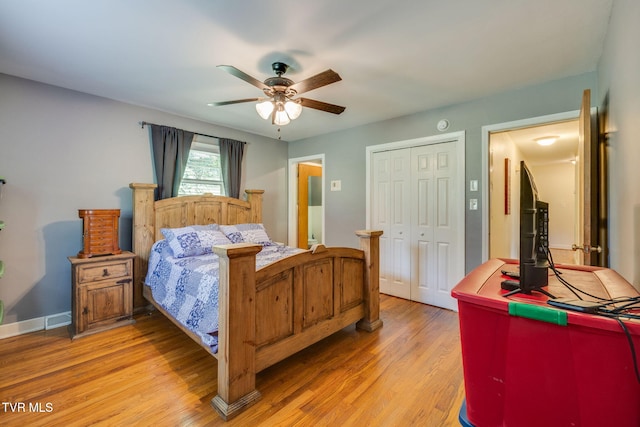 309 Knob Hill Dr, Bristol, TN 37620 - bedroom featuring light wood-style floors, a closet, and a ceiling fan