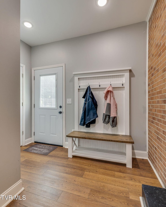 309 Knob Hill Dr, Bristol, TN 37620 - mudroom with brick wall, wood finished floors, and recessed lighting