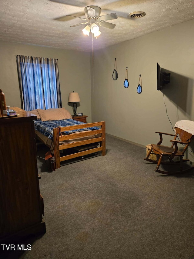 3504 James Phillips Way, Sevierville, TN 37876 - bedroom with a textured ceiling, carpet flooring, and a ceiling fan