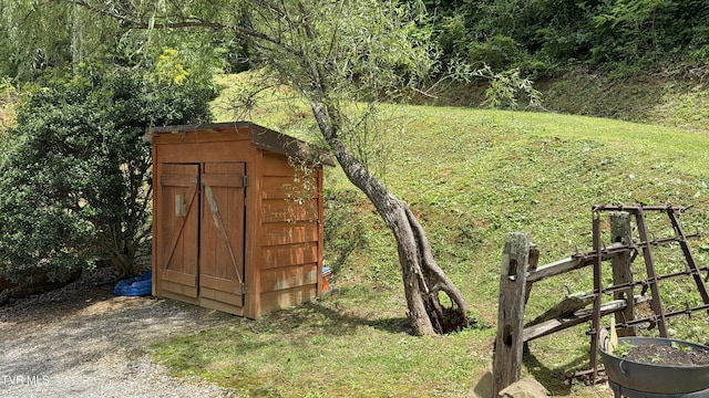 3504 James Phillips Way, Sevierville, TN 37876 - view of shed featuring a wooded view