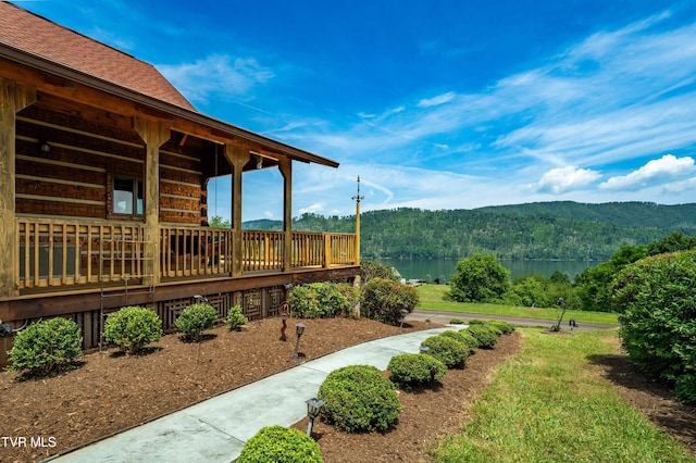 289 Harbor View Rd, Butler, TN 37640 - view of yard featuring a view of trees and a deck with water view
