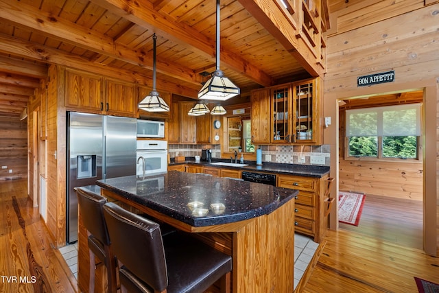 289 Harbor View Rd, Butler, TN 37640 - kitchen with white appliances, brown cabinetry, tasteful backsplash, a wood ceiling with exposed beams, and light wood finished floors