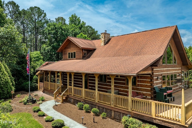 289 Harbor View Rd, Butler, TN 37640 - rear view of house with roof with shingles, a chimney, log siding, and a porch