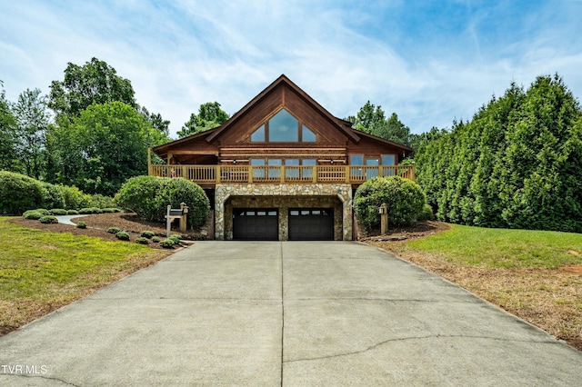 289 Harbor View Rd, Butler, TN 37640 - log cabin featuring stone siding, driveway, an attached garage, a front lawn, and a deck