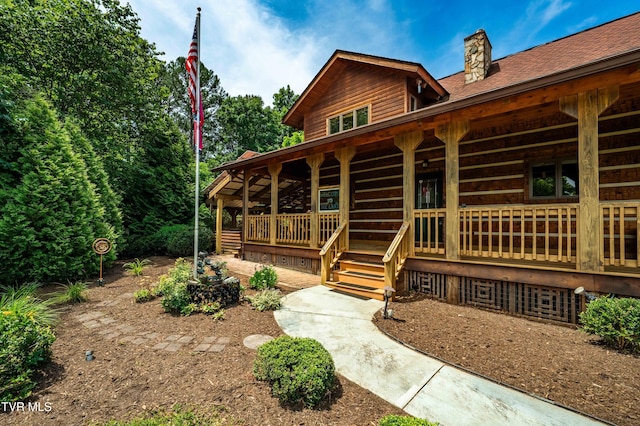 289 Harbor View Rd, Butler, TN 37640 - view of front of property featuring covered porch and a chimney