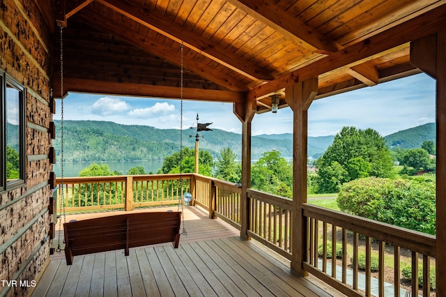 289 Harbor View Rd, Butler, TN 37640 - wooden terrace with a water and mountain view