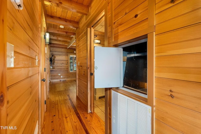 289 Harbor View Rd, Butler, TN 37640 - hall with wooden walls, a wood ceiling with exposed beams, and hardwood / wood-style floors