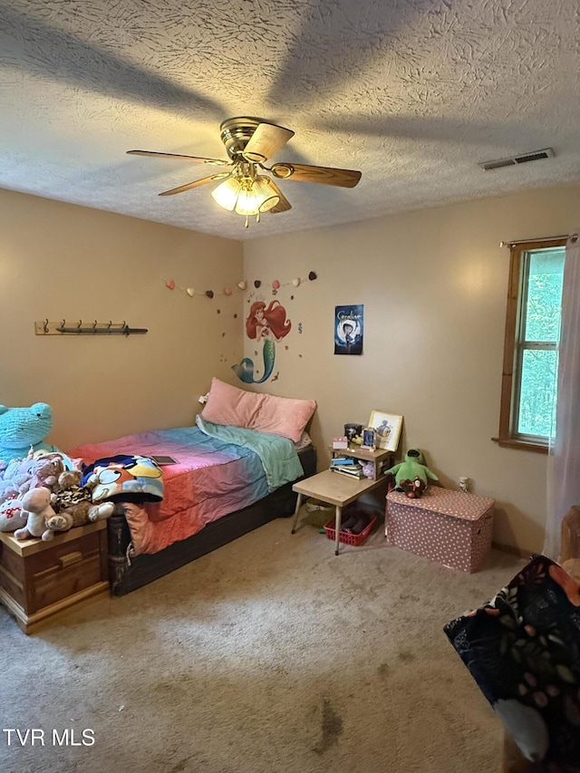 3516 James Phillips Way, Sevierville, TN 37876 - bedroom featuring carpet floors, a ceiling fan, and a textured ceiling