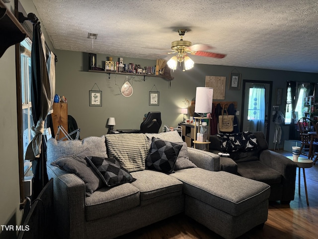 3516 James Phillips Way, Sevierville, TN 37876 - living area with a textured ceiling, wood finished floors, and a ceiling fan