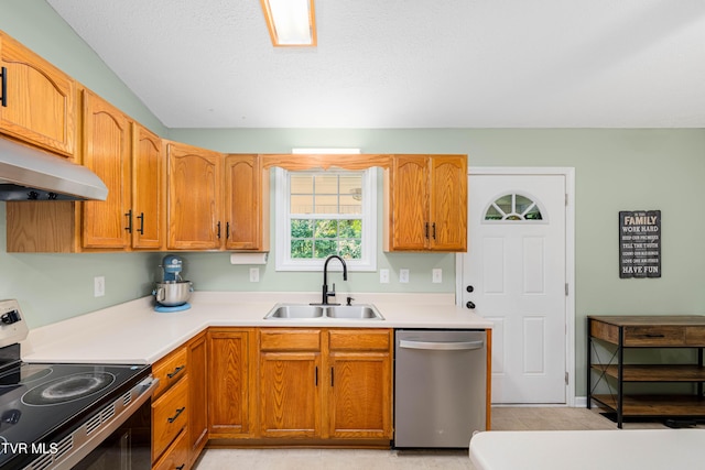 149 Cochran Rd, Jonesborough, TN 37659 - kitchen with appliances with stainless steel finishes, light countertops, lofted ceiling, and brown cabinets