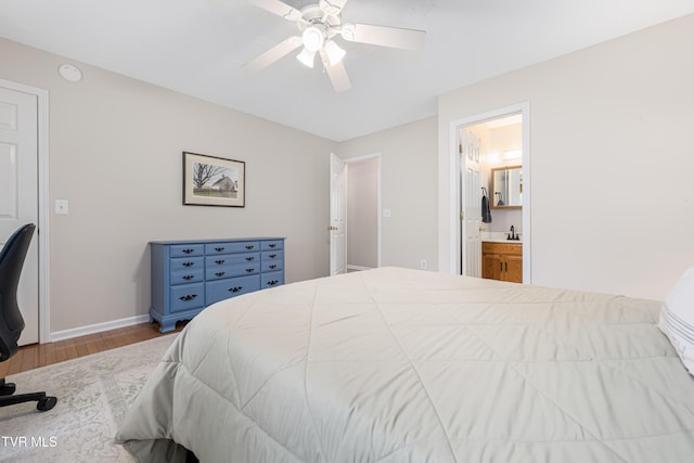 149 Cochran Rd, Jonesborough, TN 37659 - bedroom featuring wood finished floors, connected bathroom, and ceiling fan