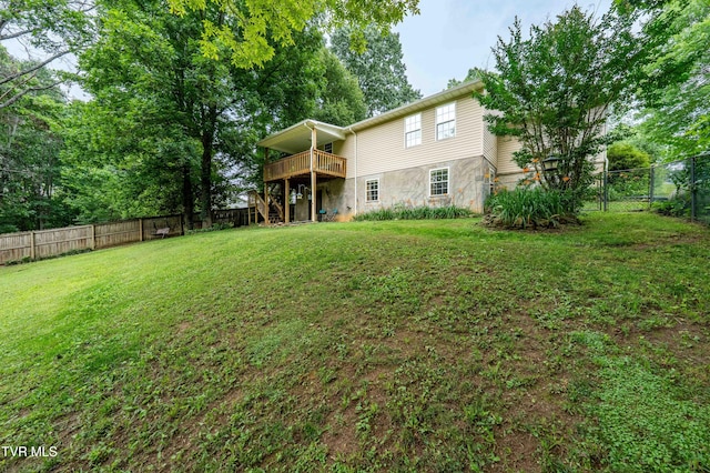 149 Cochran Rd, Jonesborough, TN 37659 - back of house featuring stairs, a fenced backyard, stone siding, and a wooden deck