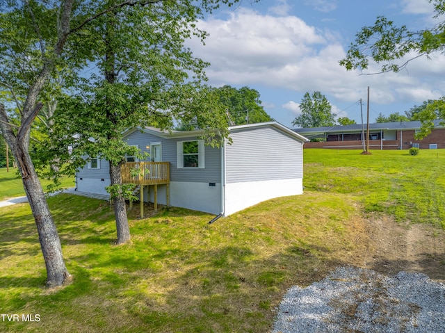 1826 Loop Rd, Lafollette, TN 37766 - view of grassy yard with a deck